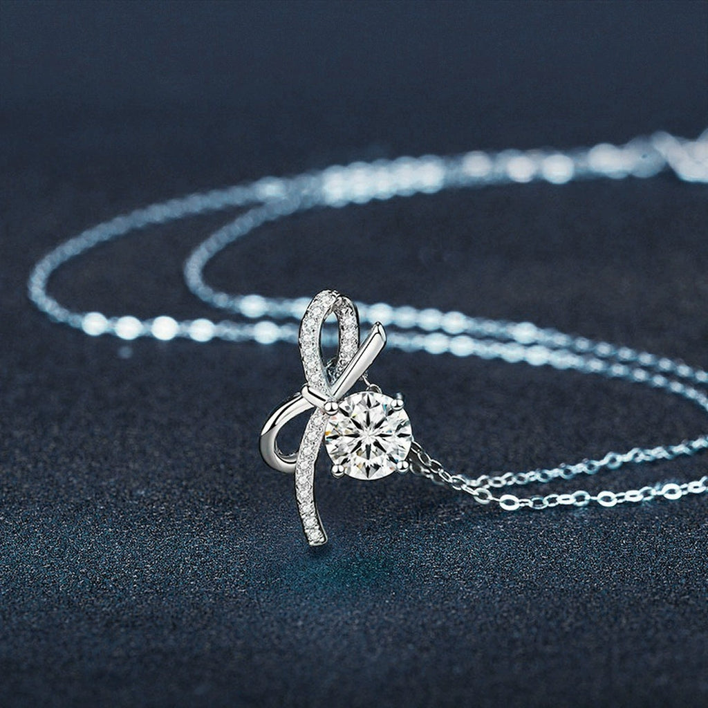 Bowknot Round Moissanite Necklace with CZ in White Gold-Plated S925 sterling silver blue display scene showing chain and stone layout