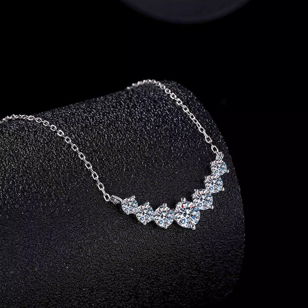 Seven-Stone Moissanite Necklace in Gold-Plated S925 sterling silver blue display scene showing chain and stone layout