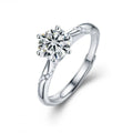 Round Moissanite Side Stone Engagement Ring with CZ in white gold-plated S925 sterling silver on clean white background