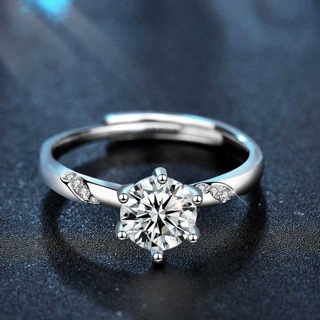 Round Moissanite Side Stone Engagement Ring with CZ product view showing moissanite setting and metal finish