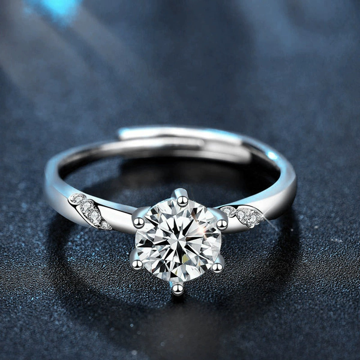 Round Moissanite Side Stone Engagement Ring with CZ product view showing moissanite setting and metal finish