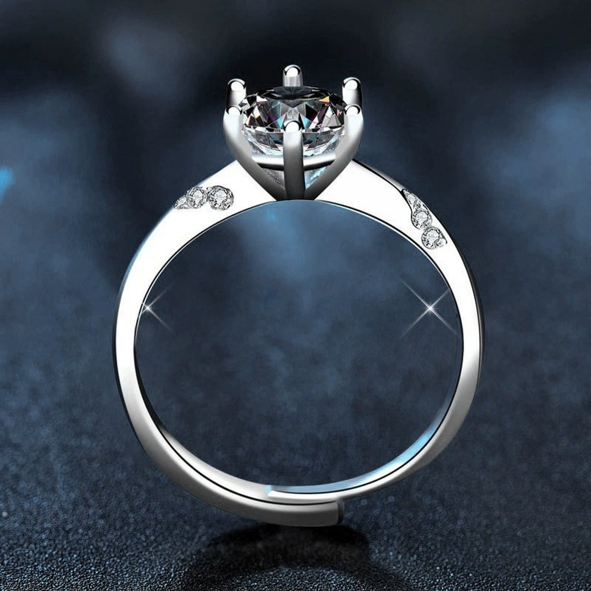 Round Moissanite Side Stone Engagement Ring with CZ product view showing moissanite setting and metal finish