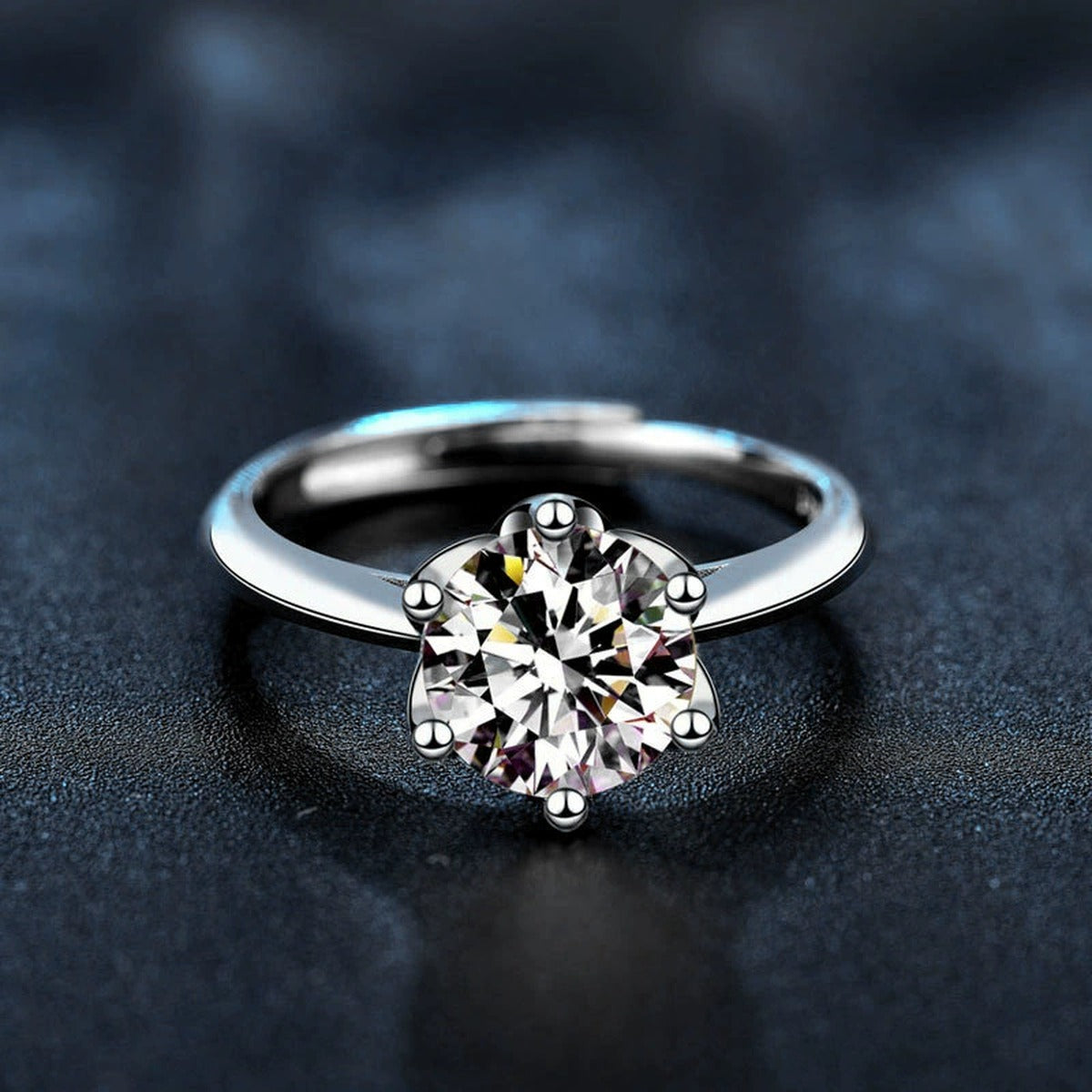 Classic Six-Prong Round Moissanite Adjustable Engagement Ring close-up detail view with moissanite sparkle