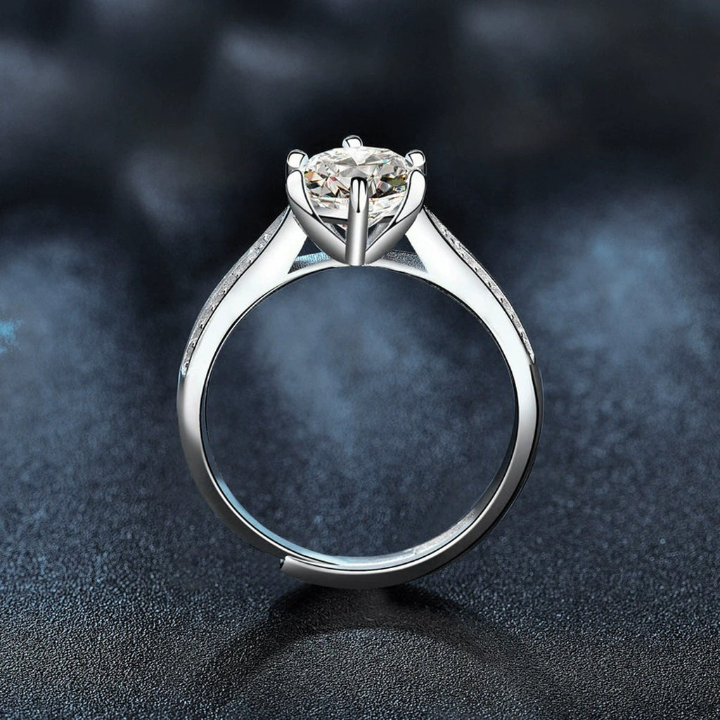 Princess-Inspired Six-Prong Round Moissanite Engagement Ring with CZ product view showing moissanite setting and metal finish