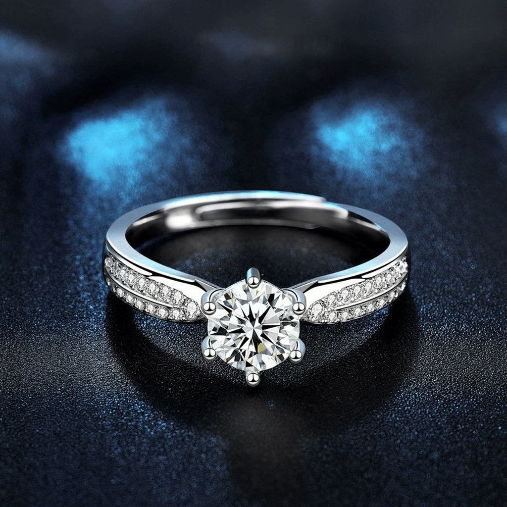 Princess-Inspired Six-Prong Round Moissanite Engagement Ring with CZ close-up detail view with moissanite sparkle