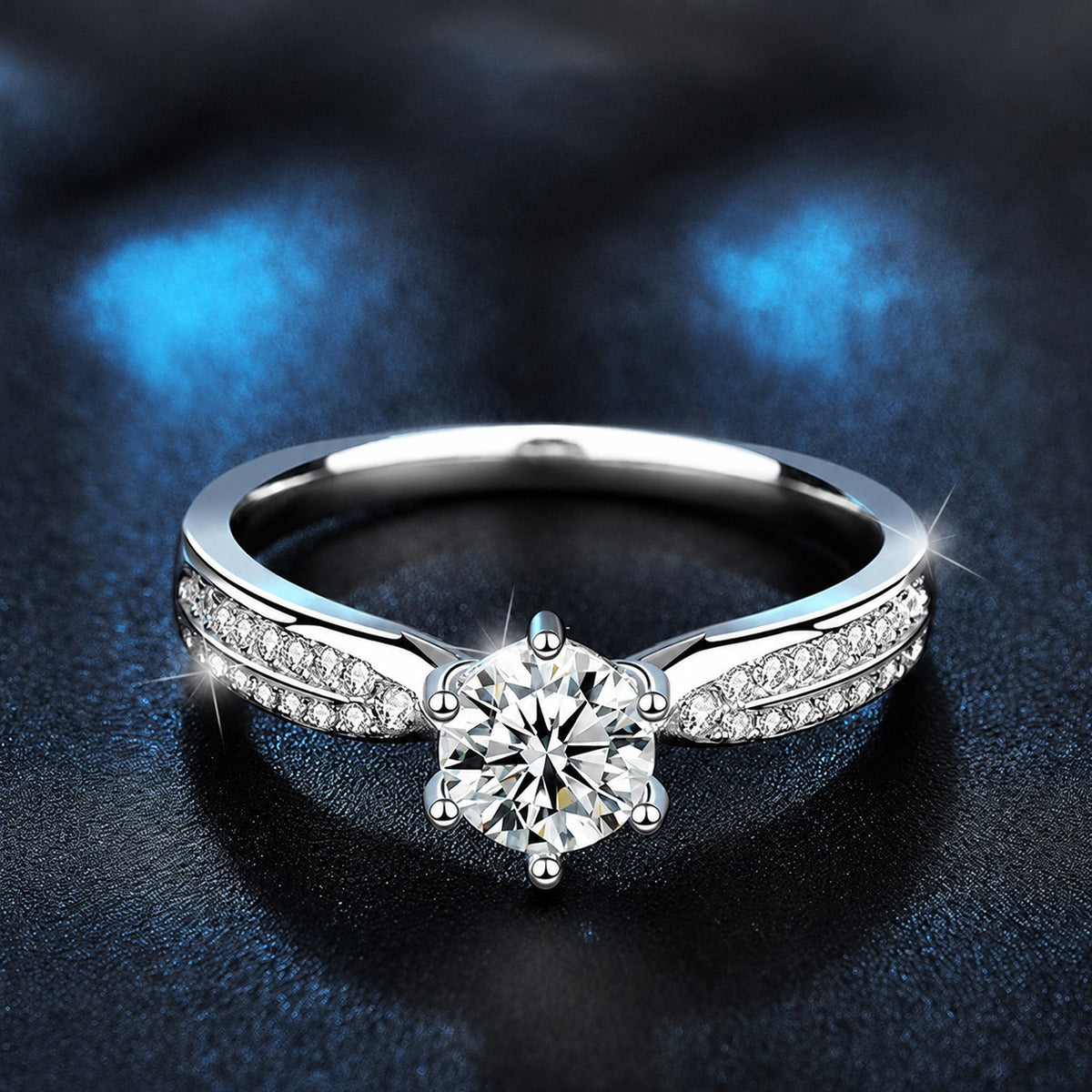 Six-Prong Round Moissanite Engagement Ring with CZ close-up detail view with moissanite sparkle