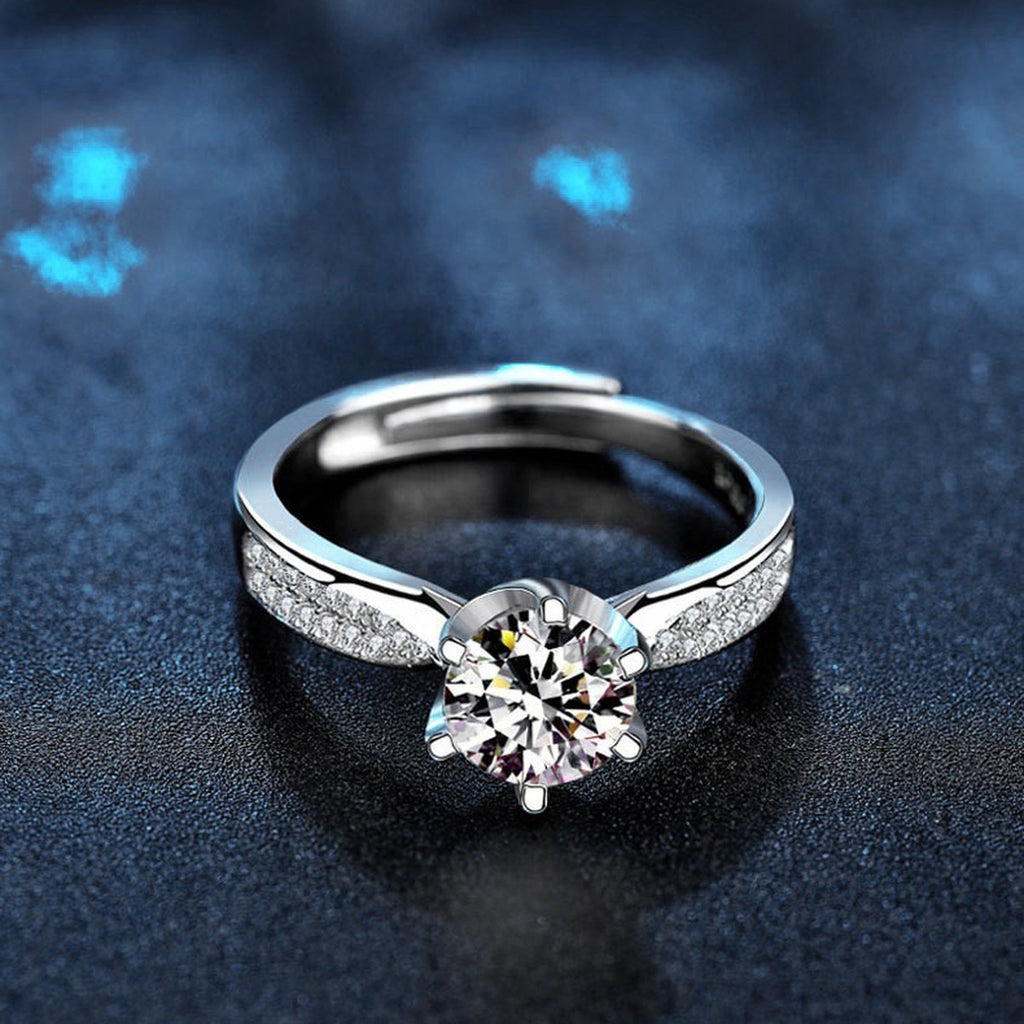 Starburst Six-Prong Round Moissanite Engagement Ring with CZ product view showing moissanite setting and metal finish