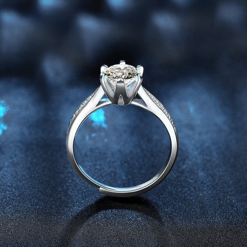 Starburst Six-Prong Round Moissanite Engagement Ring with CZ product view showing moissanite setting and metal finish