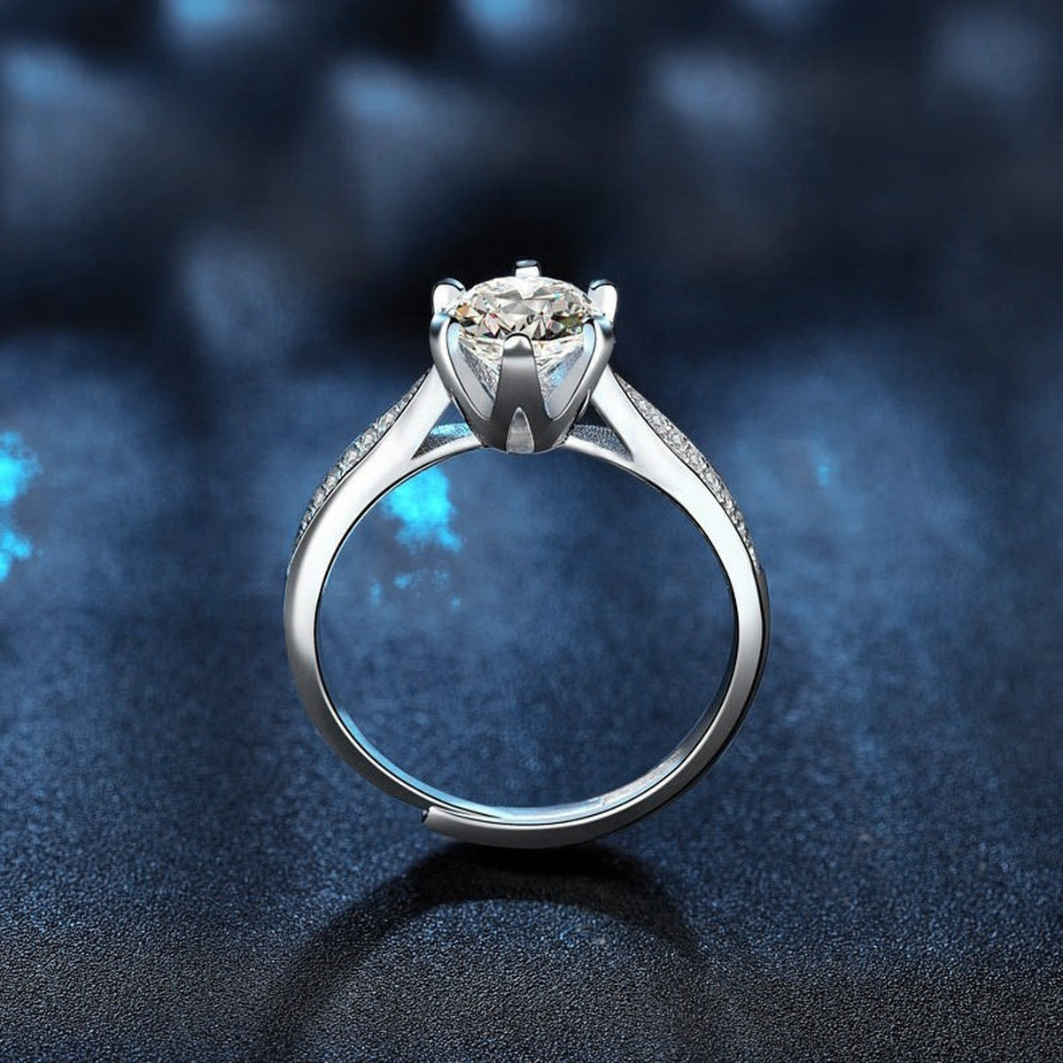 Starburst Six-Prong Round Moissanite Engagement Ring with CZ product view showing moissanite setting and metal finish