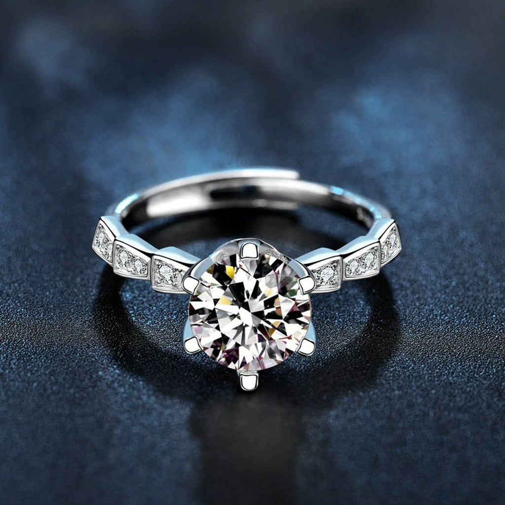 Six-Prong Round Moissanite Adjustable Engagement Ring with CZ close-up detail view with moissanite sparkle