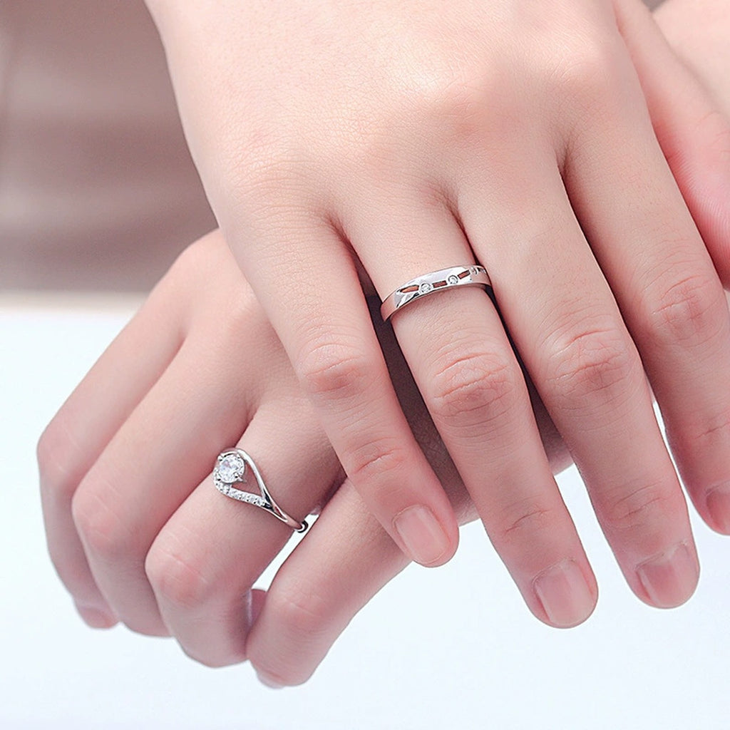 Modern Couples Adjustable Wedding Rings with CZ worn on hand to show scale, band width, and ring profile