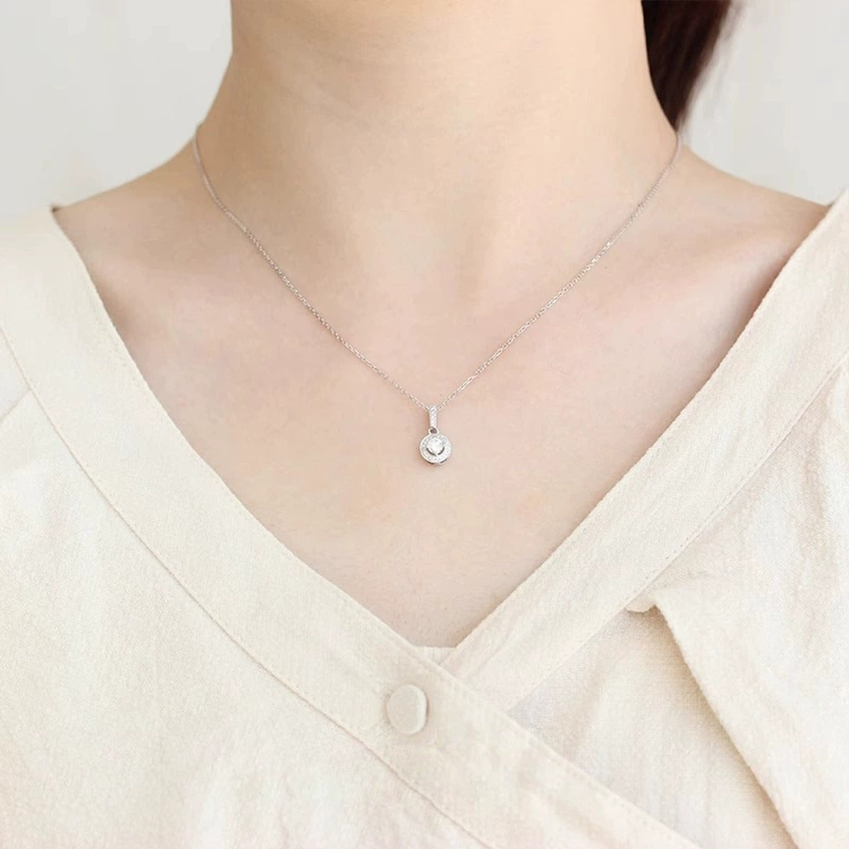 Classic Halo Round Moissanite Necklace with CZ in White Gold-Plated S925 sterling silver neckline model view showing pendant scale and chain length