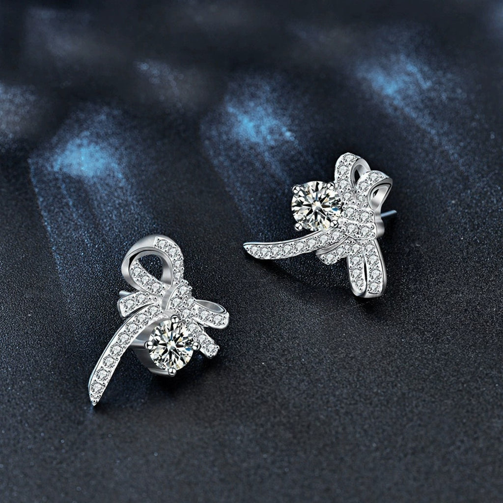 Ribbon Bow Round Moissanite Stud Earrings with CZ in White Gold-Plated S925 sterling silver product scene view showing angled setting detail