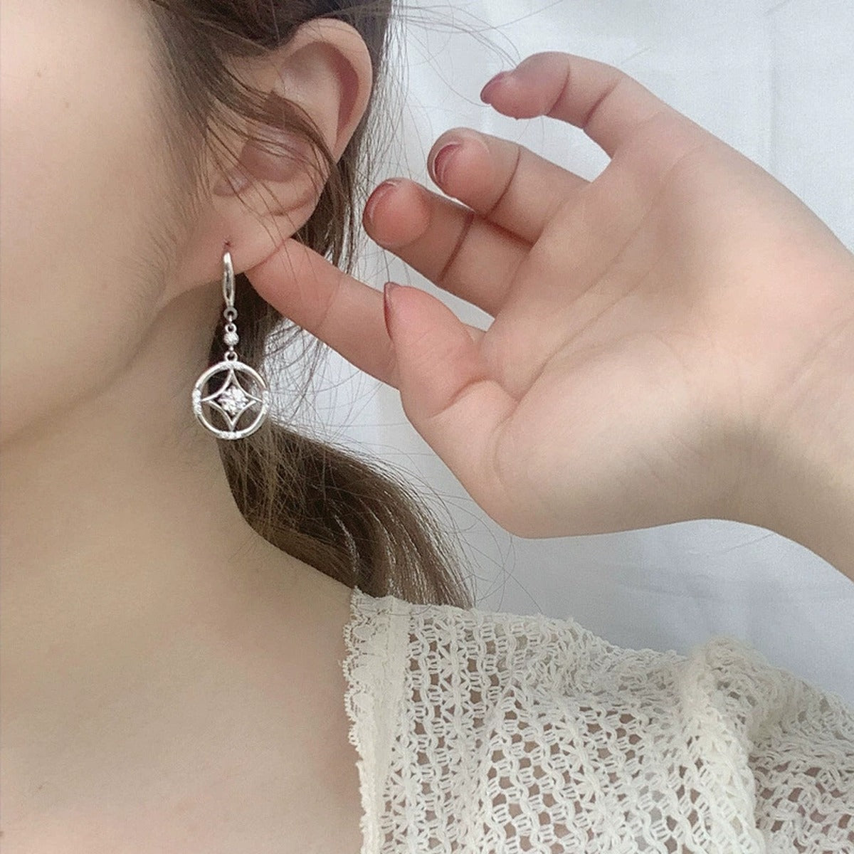 Geometric Round Moissanite Hook Dangle Earrings with CZ in White Gold-Plated S925 sterling silver worn on ear by model showing scale, placement, and hook dangle earrings styling