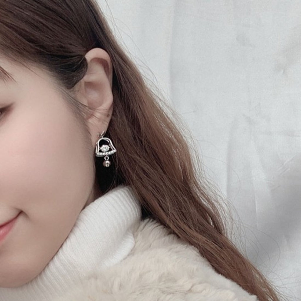 Christmas Bell Round Moissanite Stud Dangle Earrings with CZ in White Gold-Plated S925 sterling silver worn on ear by model showing scale, placement, and stud dangle earrings styling