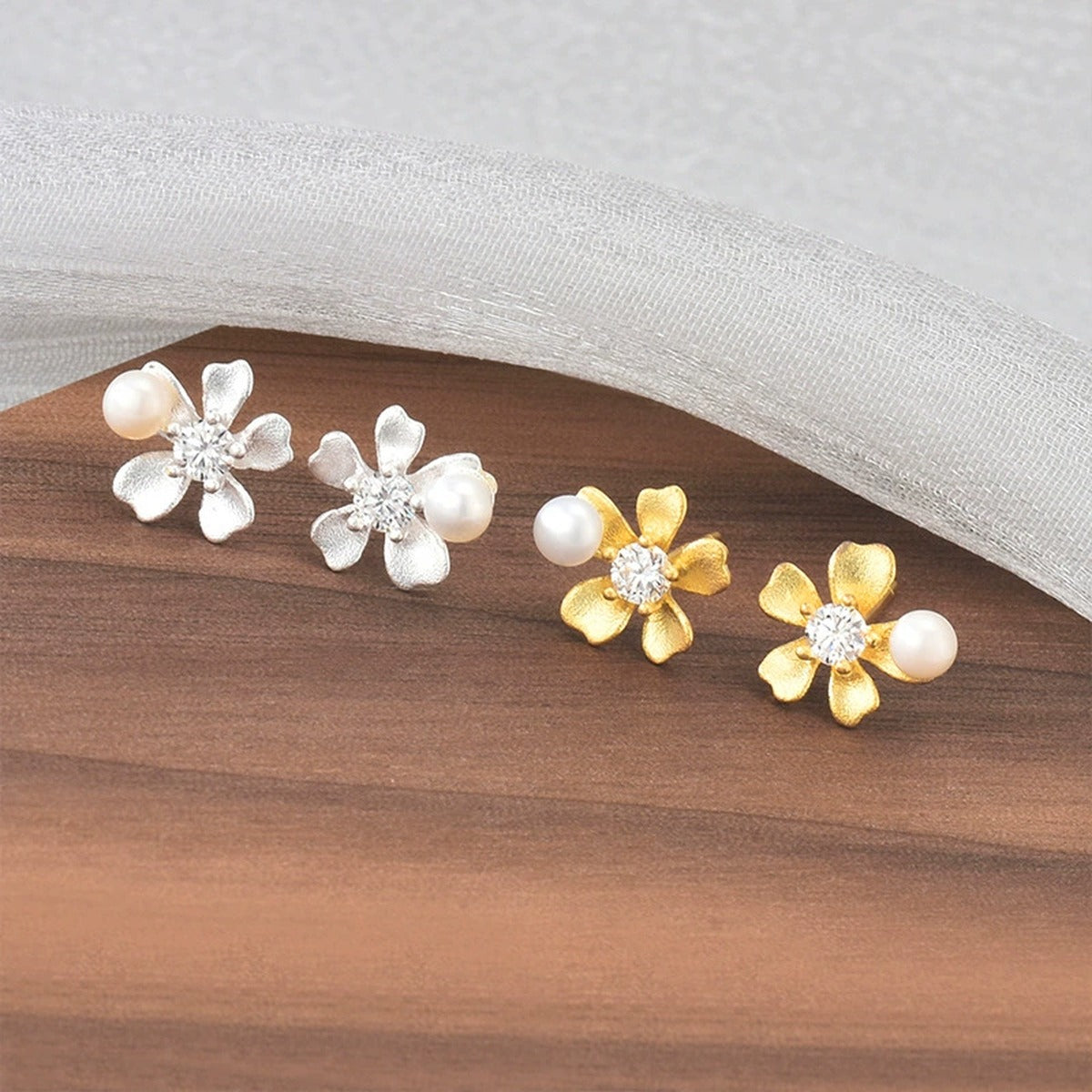 Orchid Pearl Round Moissanite Stud Earrings in Gold-Plated S925 sterling silver product scene view showing pair comparison