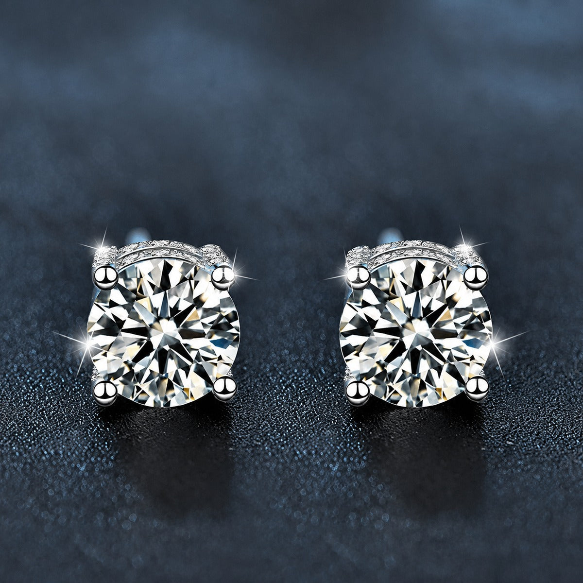 Four-Prong Round Moissanite Solitaire Stud Earrings in White Gold-Plated S925 sterling silver product scene view showing front sparkle