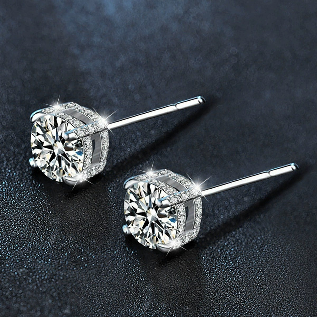 Four-Prong Round Moissanite Solitaire Stud Earrings in White Gold-Plated S925 sterling silver product scene view showing angled setting detail