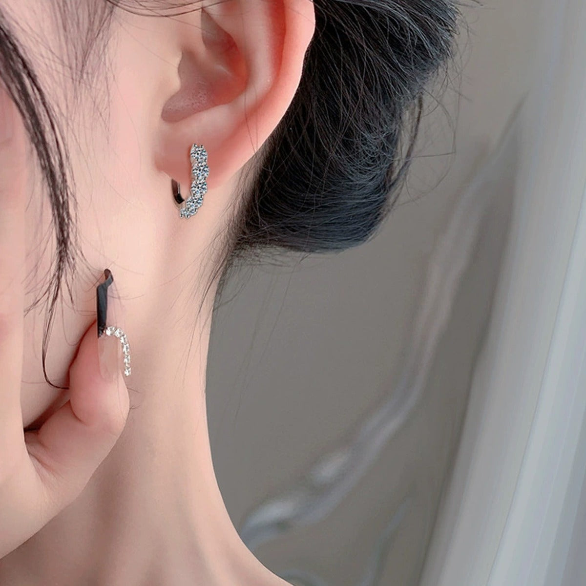 Three-Row Round Moissanite Hoop Earrings in Gold-Plated S925 sterling silver worn on ear by model showing scale, placement, and hoop earrings styling