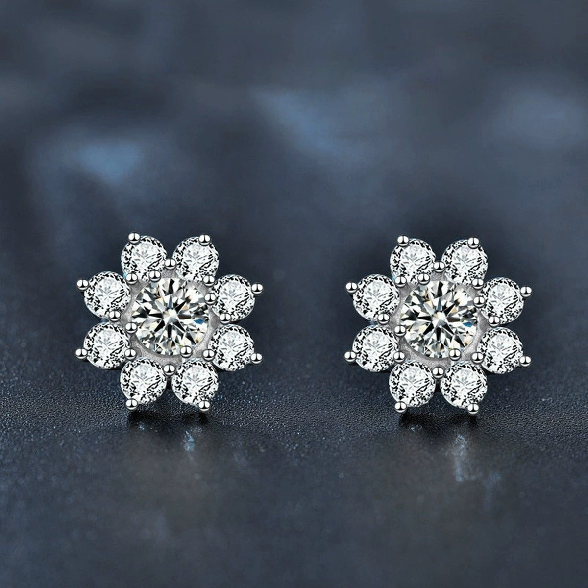 Sunflower Round Moissanite Stud Earrings with CZ in White Gold-Plated S925 sterling silver product scene view showing angled setting detail