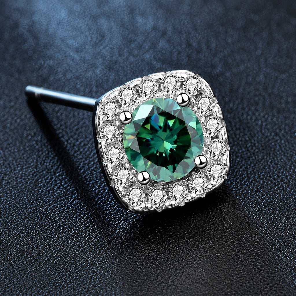 Green moissanite cushion halo stud earrings close-up showing the round center stone and polished prong setting