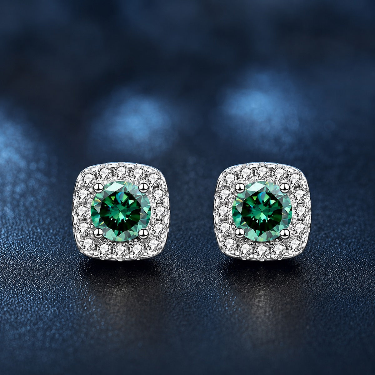 Green round moissanite stud earrings detail view showing the cushion-shaped CZ halo and S925 silver setting