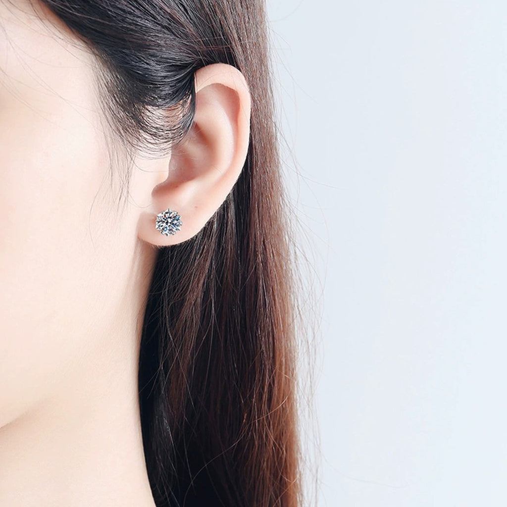 Snowflake Round Moissanite Solitaire Stud Earrings in Gold-Plated S925 sterling silver worn on ear by model showing scale, placement, and stud earrings styling