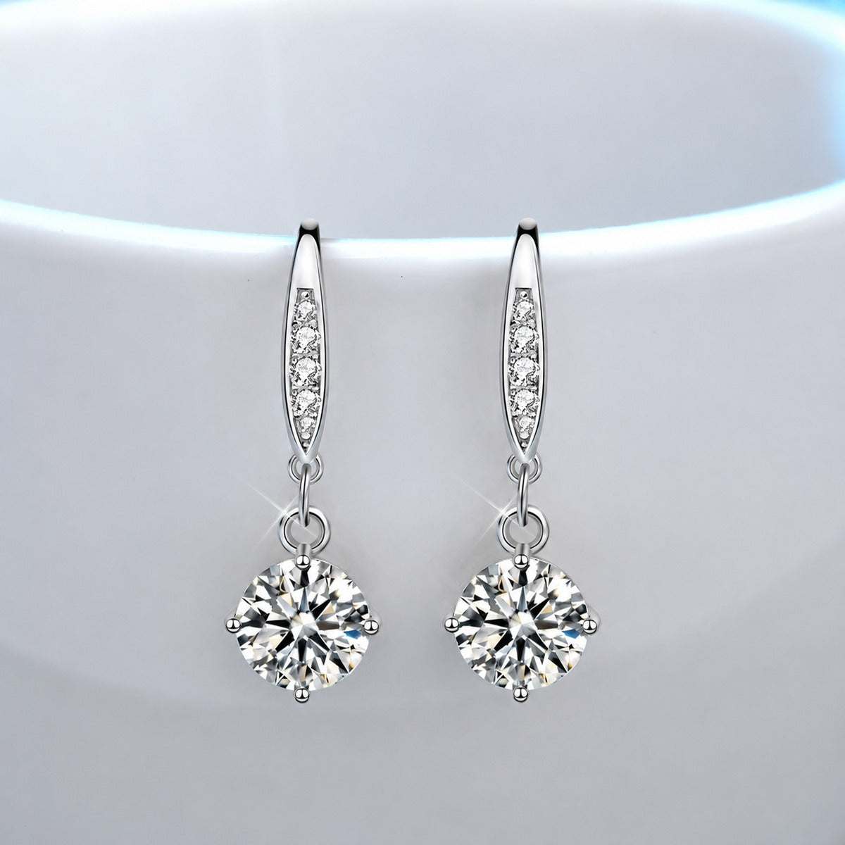 Round Moissanite Solitaire Hook Dangle Earrings in White Gold-Plated S925 sterling silver product scene view showing front sparkle