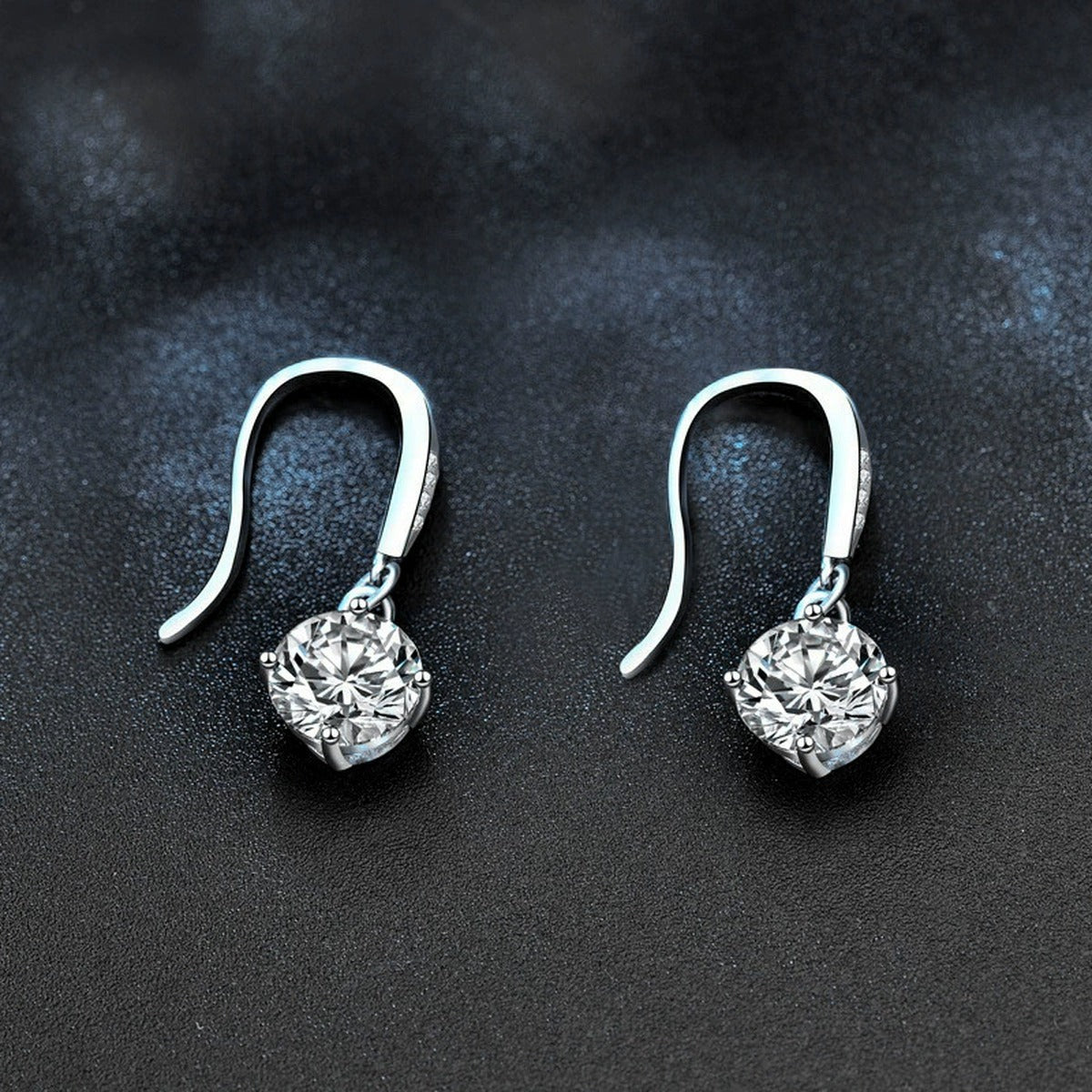 Round Moissanite Solitaire Hook Dangle Earrings in White Gold-Plated S925 sterling silver product scene view showing angled setting detail