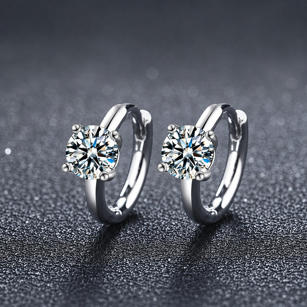 Four-Prong Round Moissanite Huggie Hoop Earrings in Gold-Plated S925 sterling silver product scene view showing angled setting detail