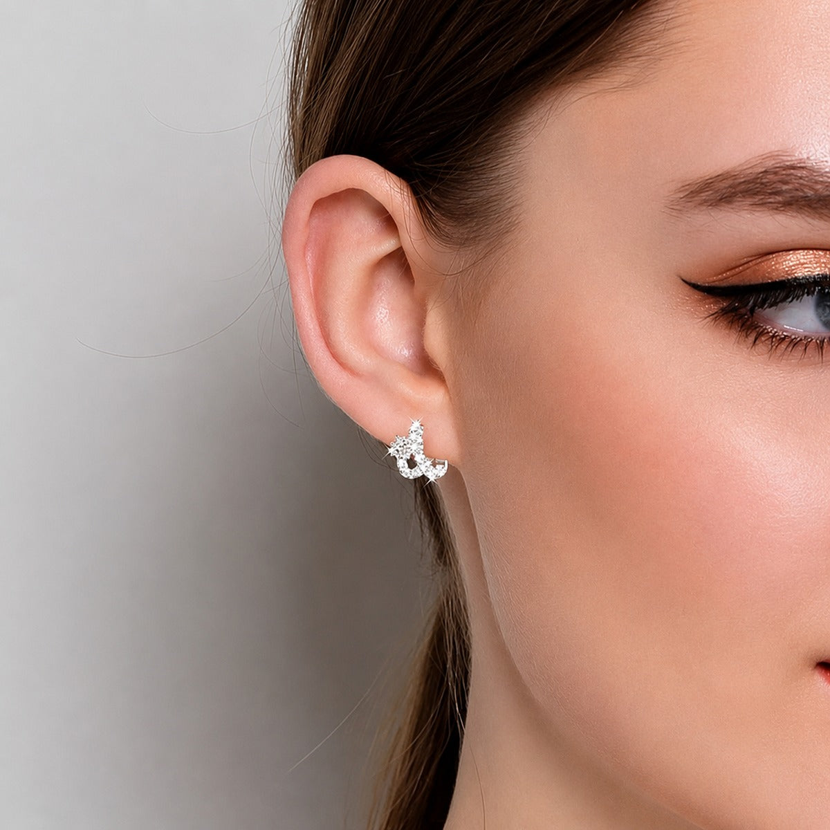 Floral Round Moissanite Huggie Hoop Earrings with CZ in Gold-Plated S925 sterling silver worn on ear by model showing scale, placement, and huggie hoop earrings styling