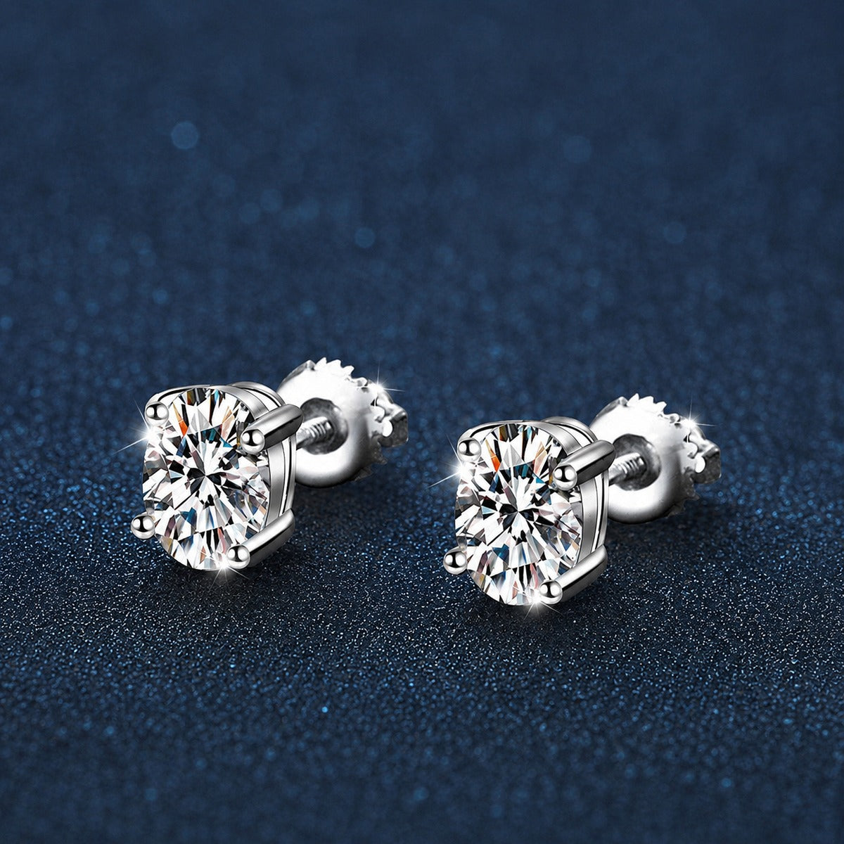 Oval Moissanite Four-Prong Stud Earrings in White Gold-Plated S925 sterling silver product scene view showing front sparkle