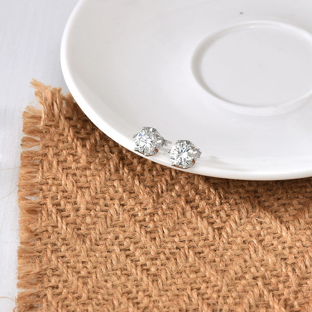 Crown Six-Prong Round Moissanite Stud Earrings in Gold-Plated S925 sterling silver product scene view showing angled setting detail