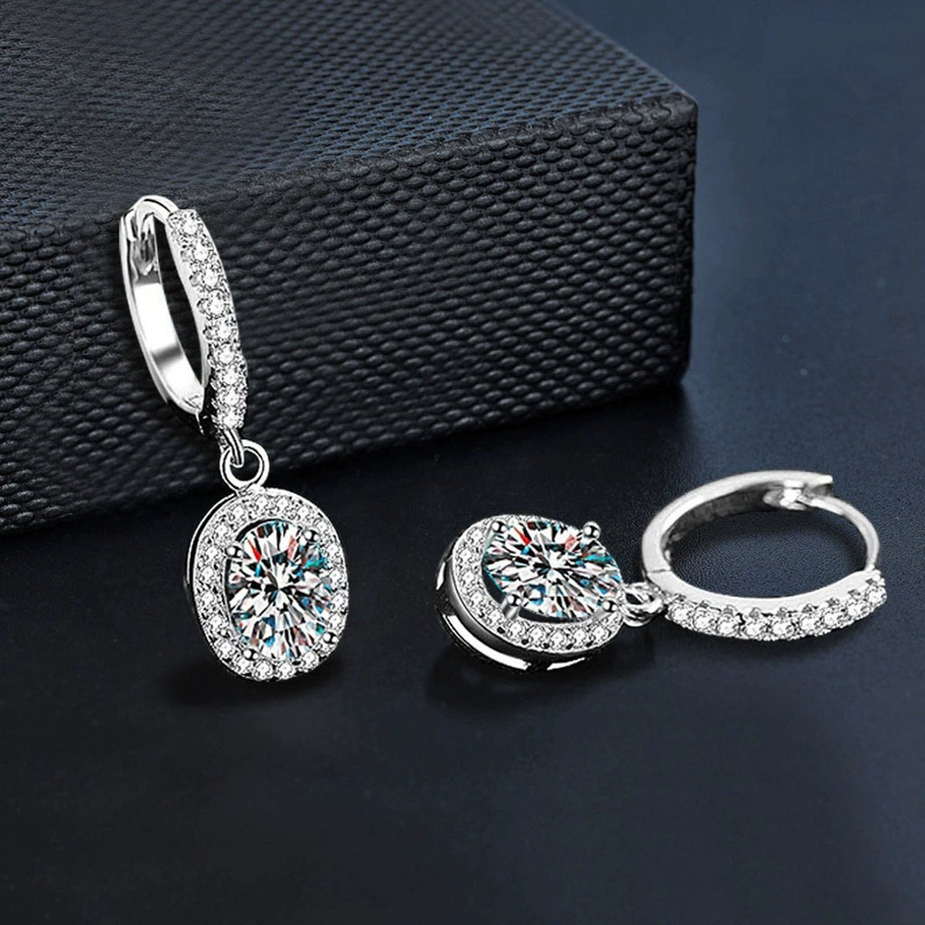 Oval Halo Moissanite Hoop Dangle Earrings with CZ in White Gold-Plated S925 sterling silver product scene view showing angled setting detail