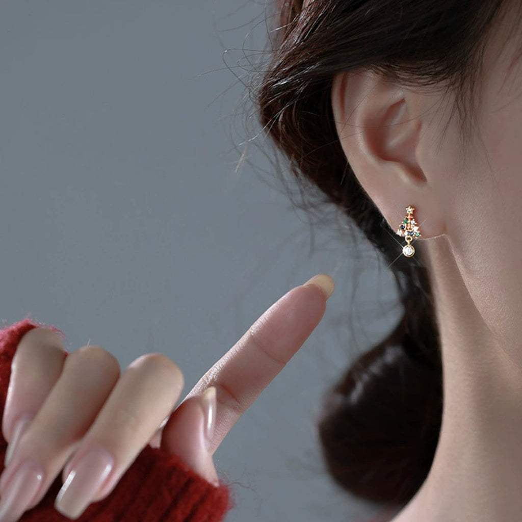 Christmas Tree Round Moissanite Stud Dangle Earrings with CZ in Gold-Plated S925 sterling silver worn on ear by model showing scale, placement, and stud dangle earrings styling