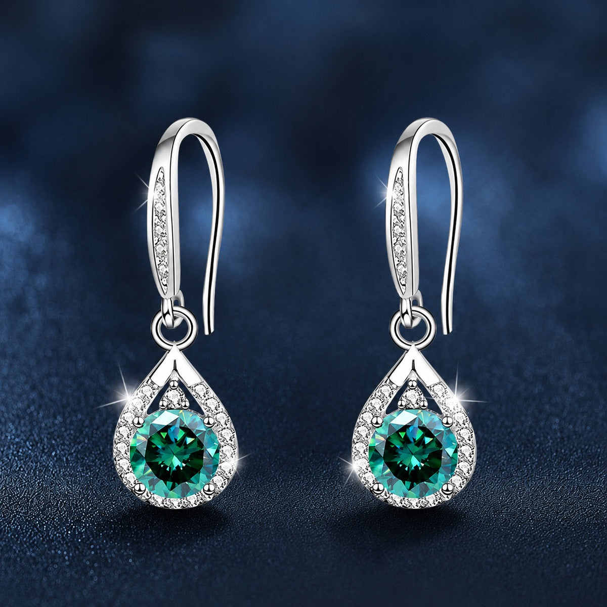 Green round moissanite hook dangle earrings close-up showing the teardrop CZ setting and polished S925 silver hook