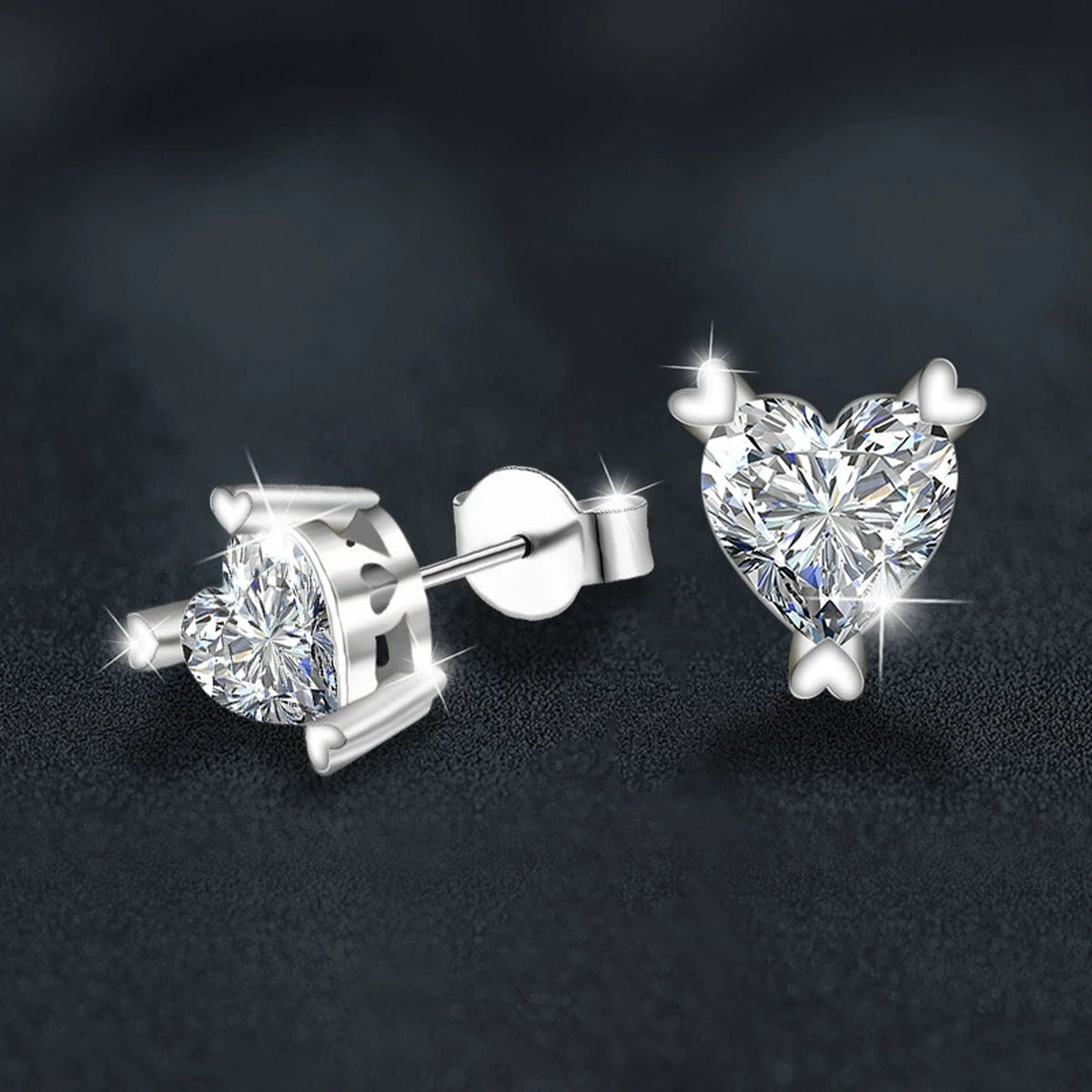 Heart Cut Moissanite Solitaire Stud Earrings in White Gold-Plated S925 sterling silver product scene view showing angled setting detail