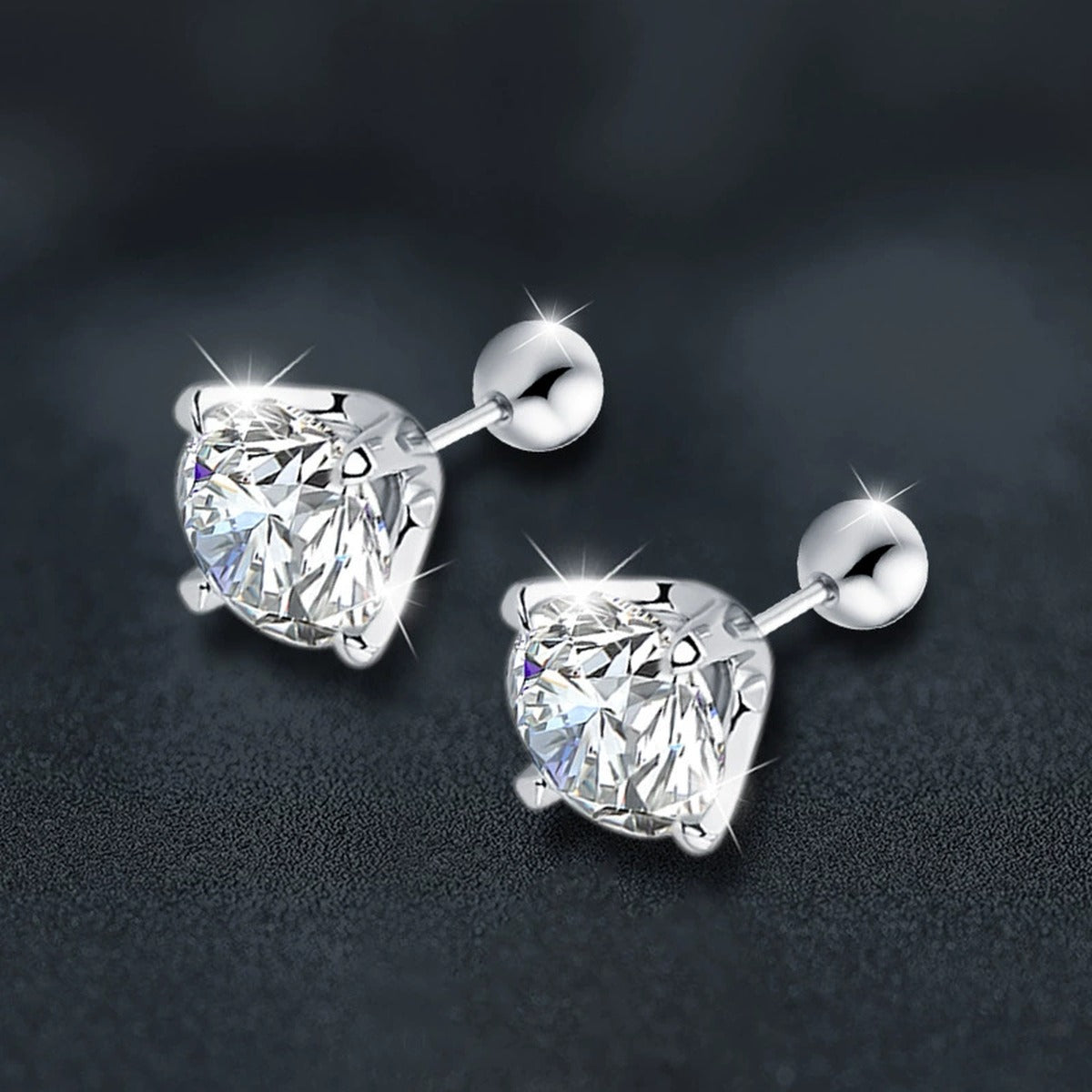 Four-Prong Round Moissanite Screw-Back Stud Earrings in White Gold-Plated S925 sterling silver product scene view showing angled setting detail