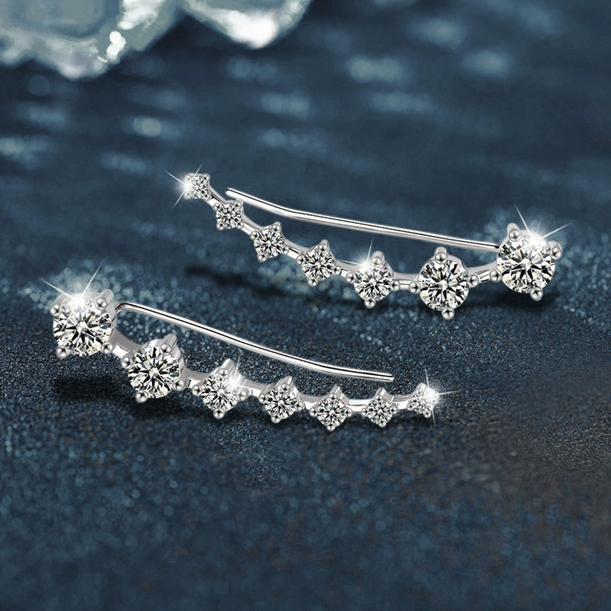 Graduated Round Moissanite Ear Climber Earrings in White Gold-Plated S925 sterling silver product scene view showing angled setting detail