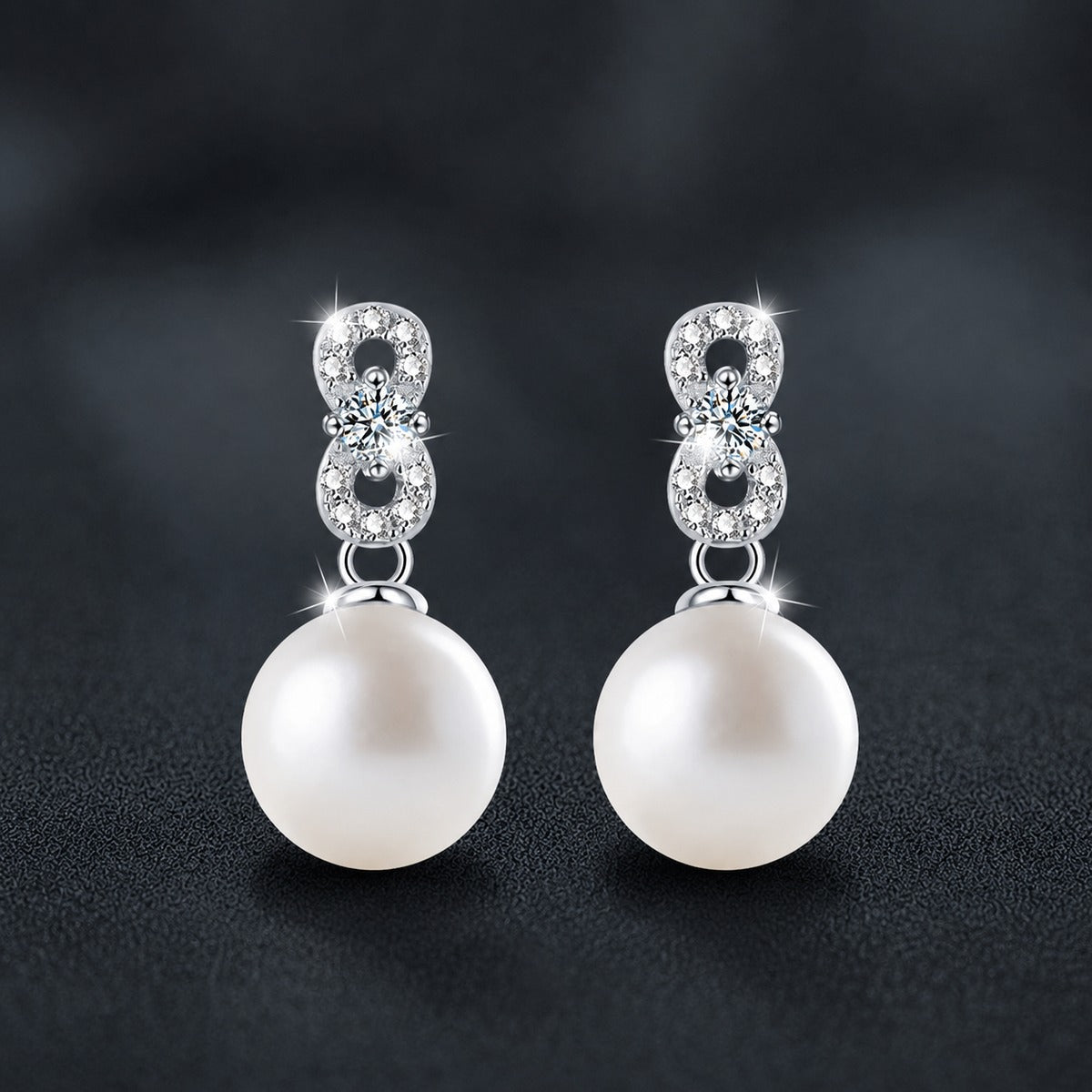 Infinity Round Moissanite and Pearl Stud Dangle Earrings with CZ in White Gold-Plated S925 sterling silver product scene view showing front sparkle
