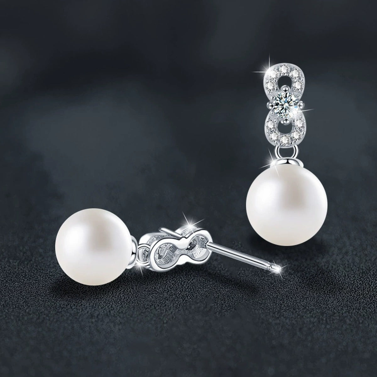 Infinity Round Moissanite and Pearl Stud Dangle Earrings with CZ in White Gold-Plated S925 sterling silver product scene view showing side profile