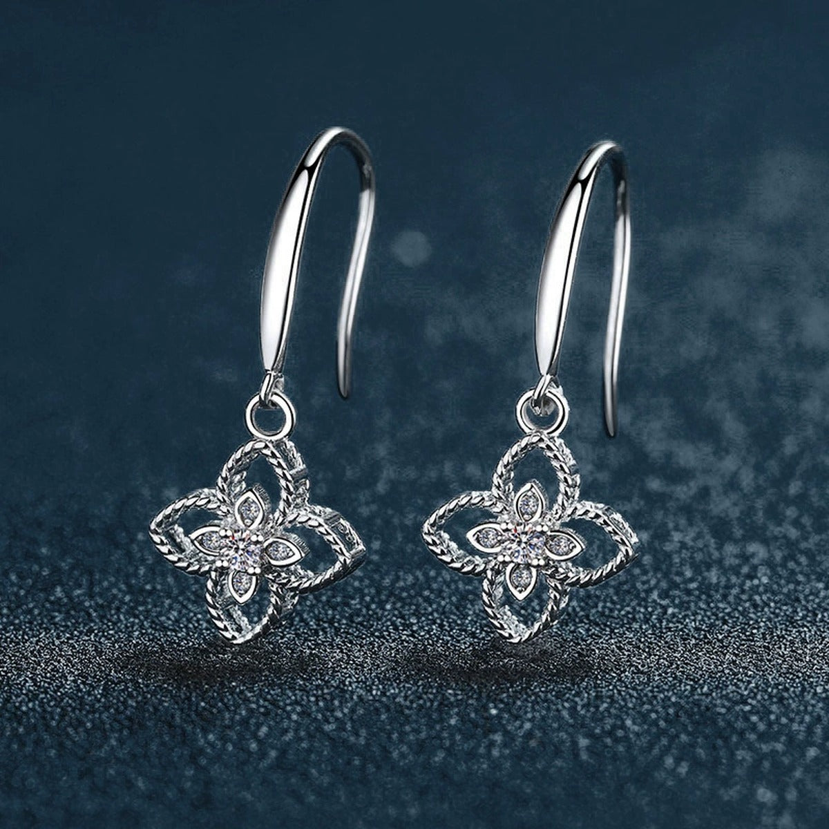 Four-Leaf Clover Round Moissanite Hook Dangle Earrings with CZ in White Gold-Plated S925 sterling silver product scene view showing angled setting detail
