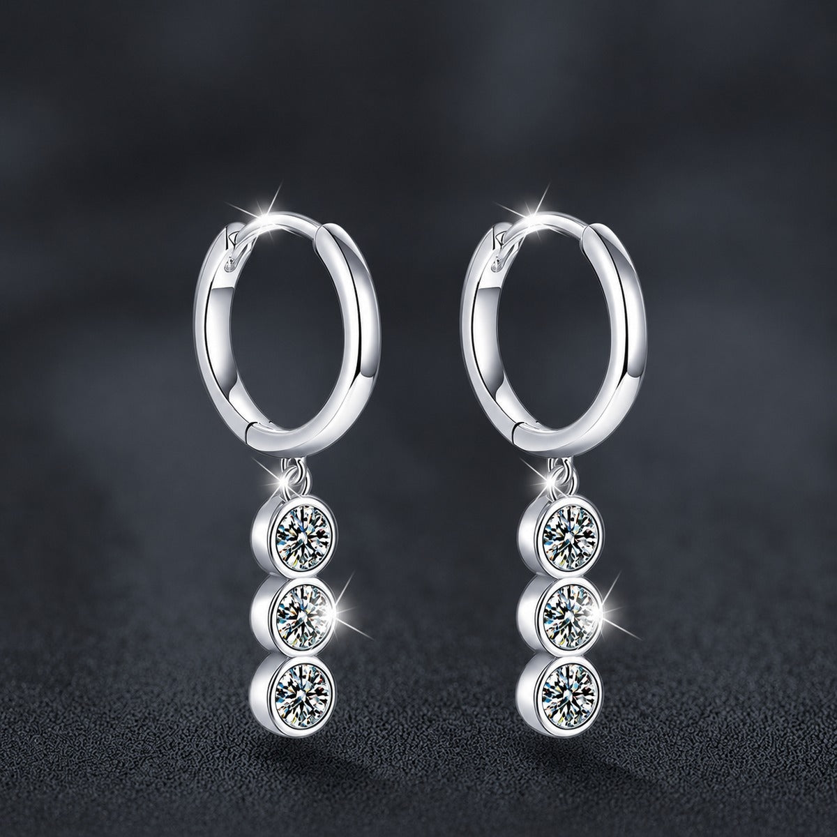Graduated Round Moissanite Hoop Dangle Earrings in White Gold-Plated S925 sterling silver product scene view showing front sparkle