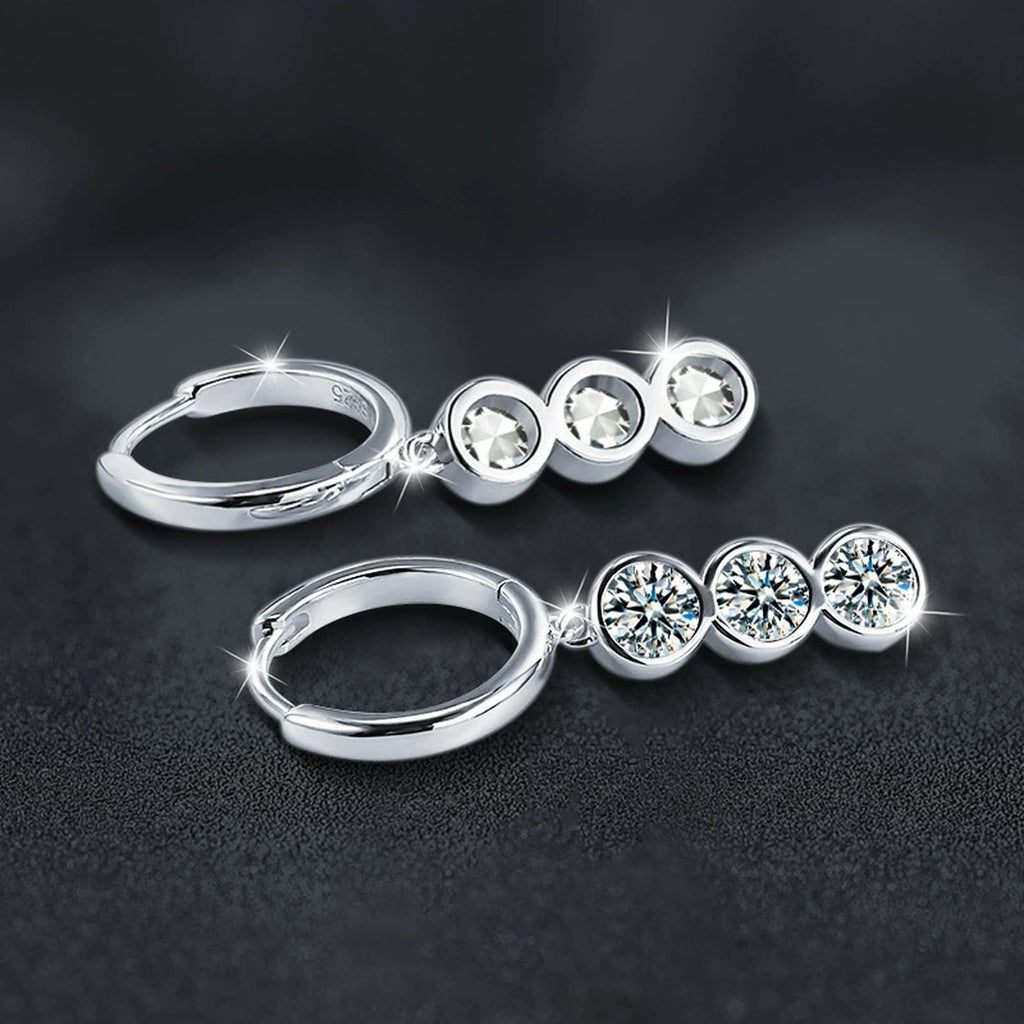 Graduated Round Moissanite Hoop Dangle Earrings in White Gold-Plated S925 sterling silver product scene view showing angled setting detail