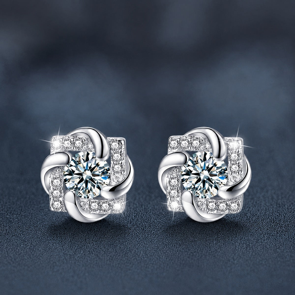 Rotating Pinwheel Round Moissanite Stud Earrings with CZ in White Gold-Plated S925 sterling silver product scene view showing front sparkle
