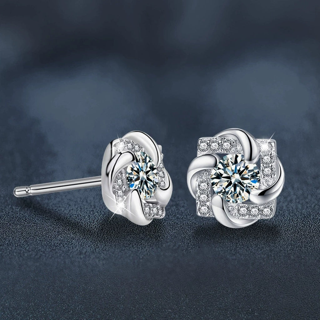Rotating Pinwheel Round Moissanite Stud Earrings with CZ in White Gold-Plated S925 sterling silver product scene view showing angled setting detail
