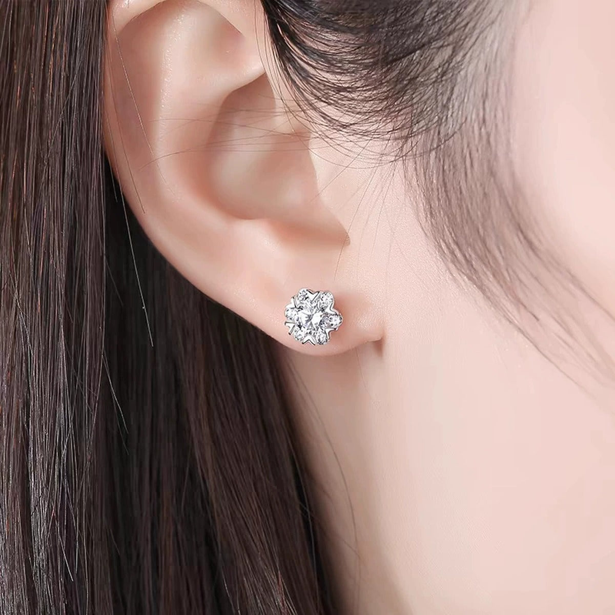 Snowflake Round Moissanite Stud Earrings with CZ in White Gold-Plated S925 sterling silver worn on ear by model showing scale, placement, and stud earrings styling