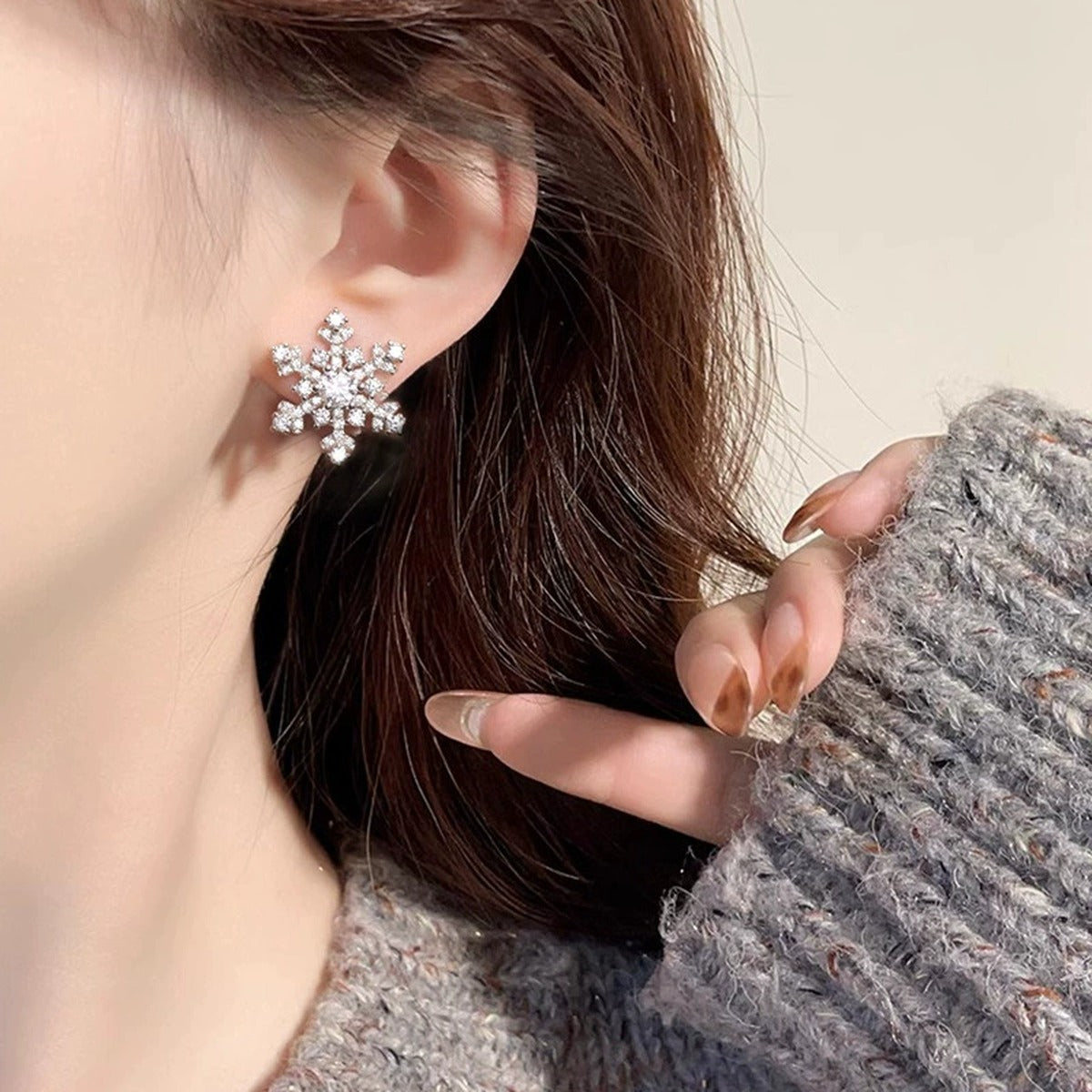 Snowflake Round Moissanite Stud Earrings with CZ in White Gold-Plated S925 sterling silver worn on ear by model showing scale, placement, and stud earrings styling