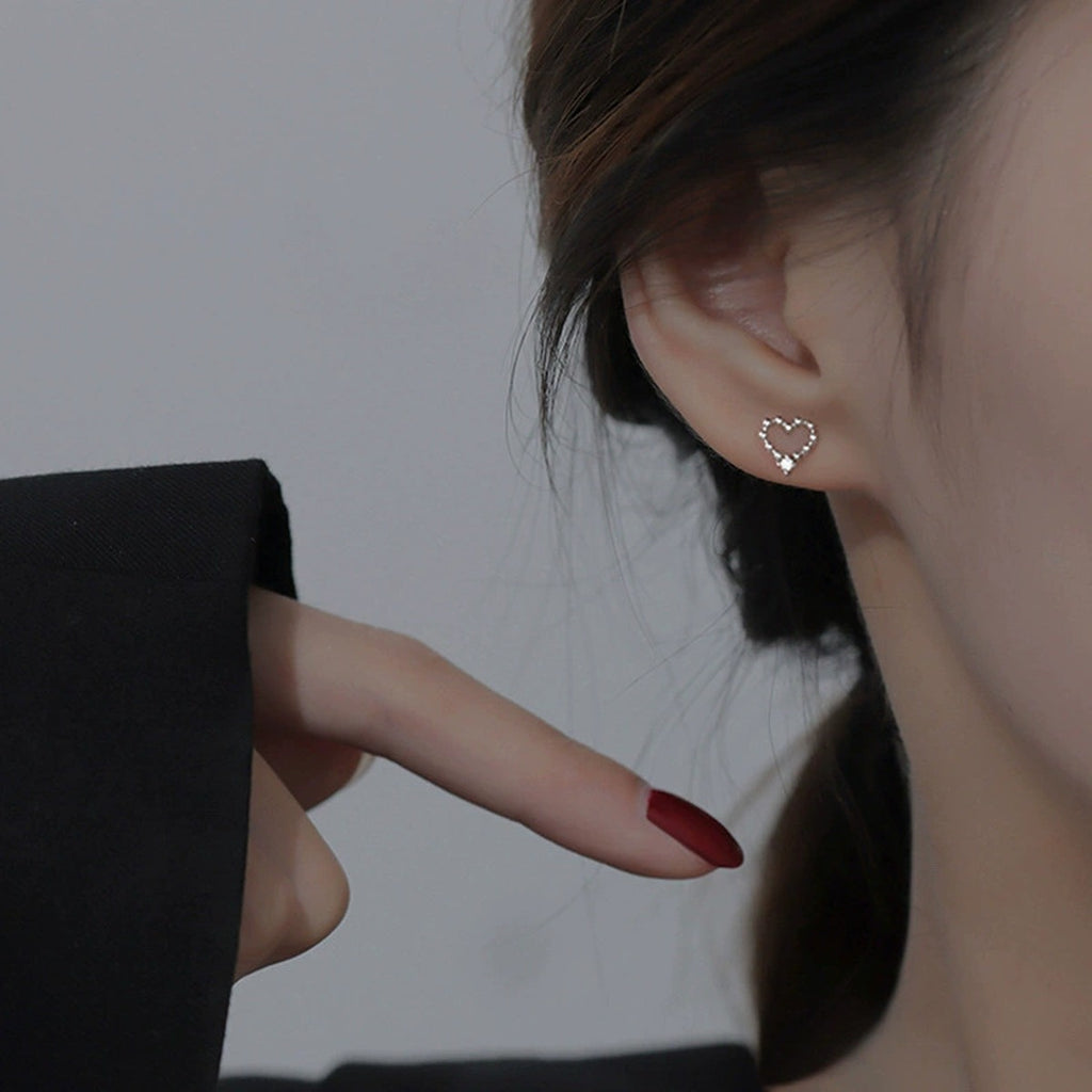 Beaded Heart Round Moissanite Stud Earrings in Gold-Plated S925 sterling silver worn on ear by model showing scale, placement, and stud earrings styling