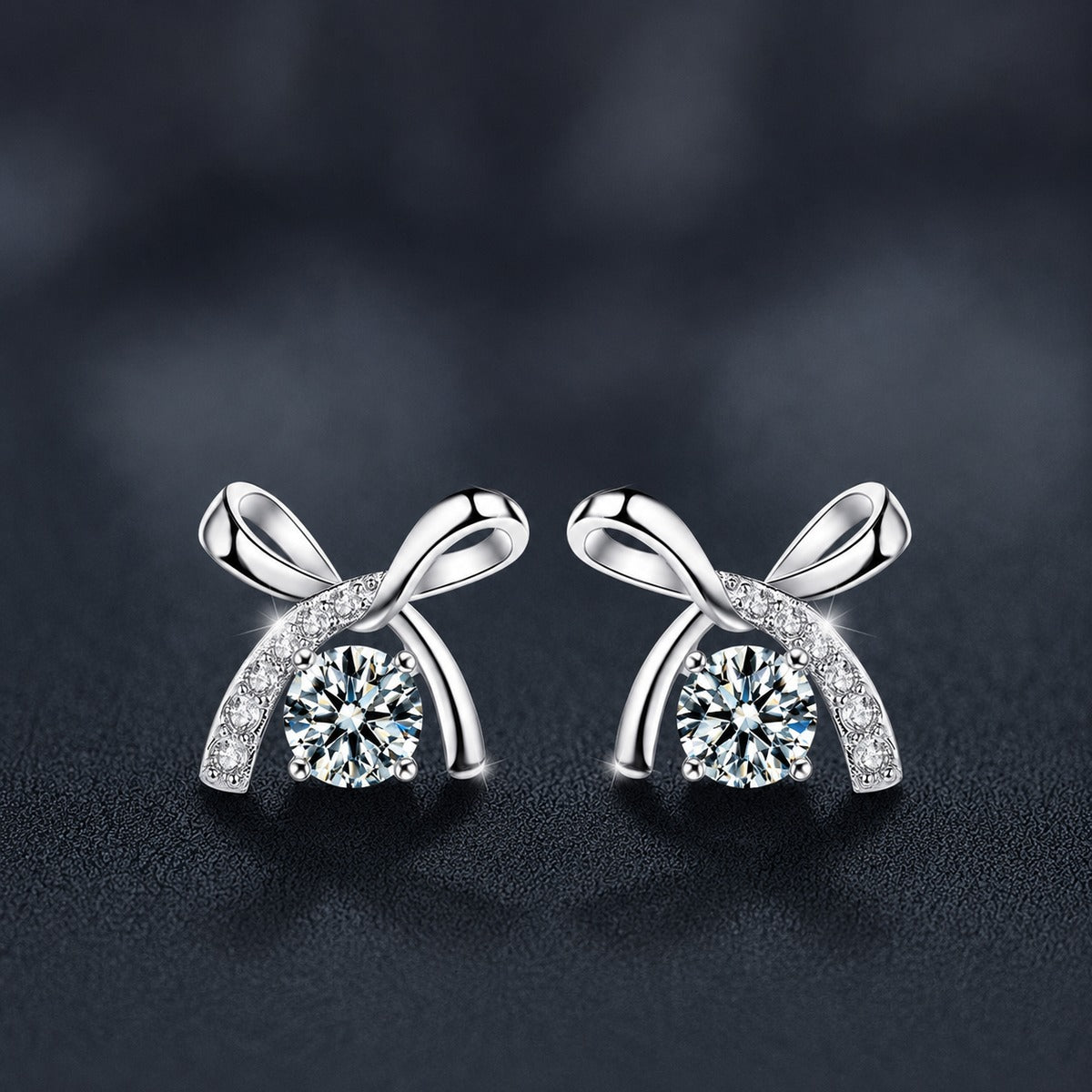 Ribbon Bow Round Moissanite Stud Earrings with CZ in Gold-Plated S925 sterling silver product scene view showing angled setting detail